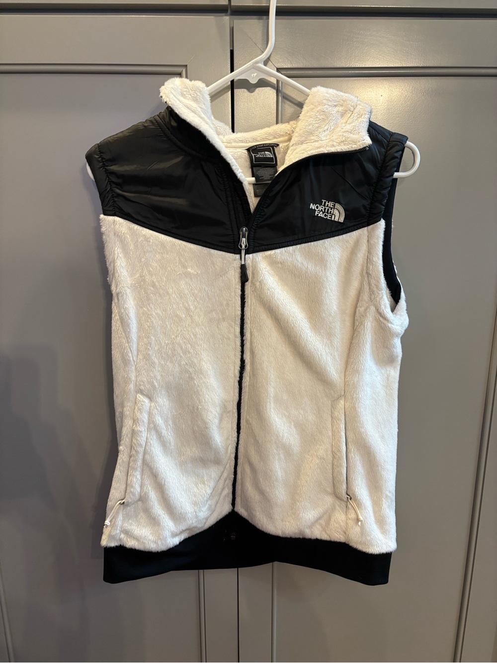Woman’s North Face Fuzzy hooded Vest M